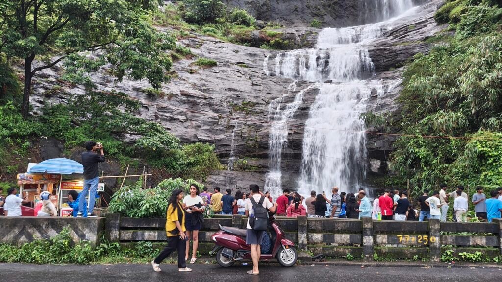 Visitors stopping at Cheeyappara Waterfalls on NH 85